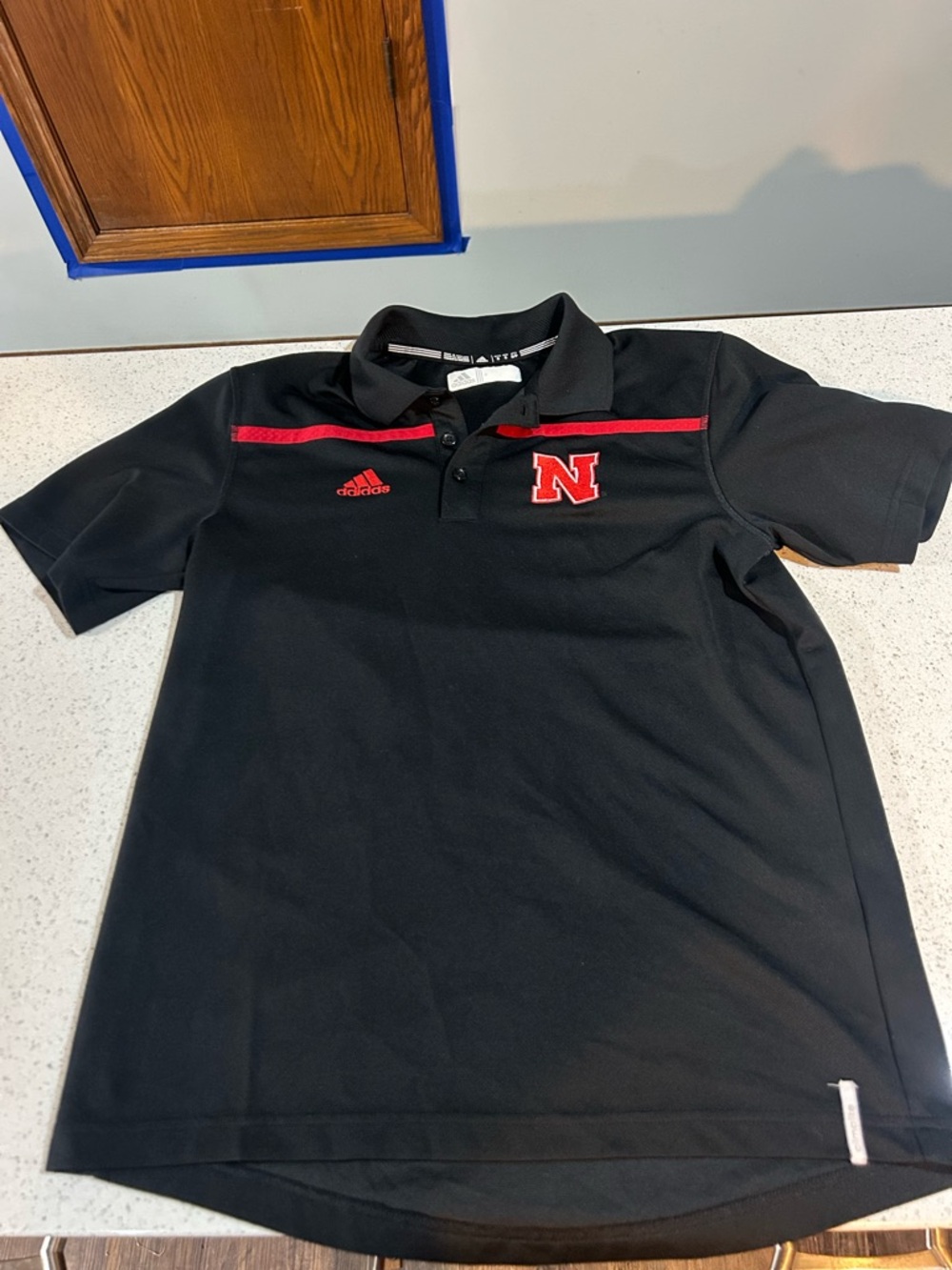 Nebraska Black Polo with red lettering